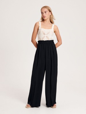 Reserved Palazzo trousers Čierne | 81953LFXU