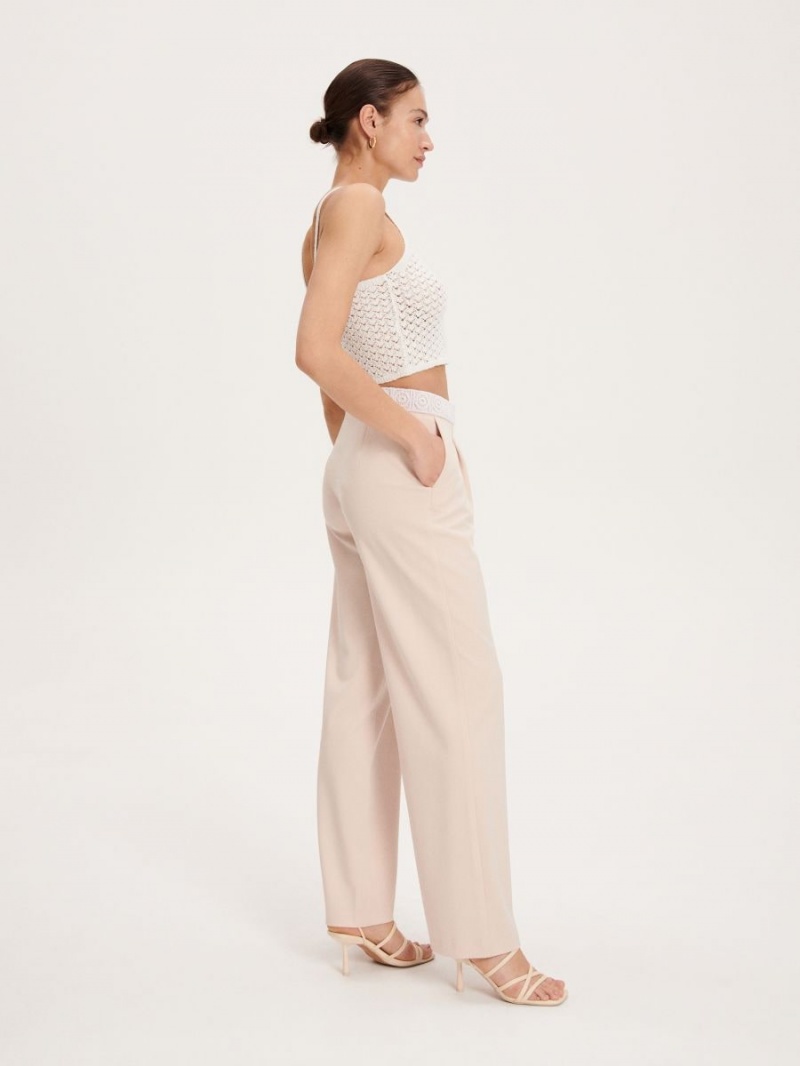 Reserved Trousers with decorative waistband Béžové | 31687BRYH